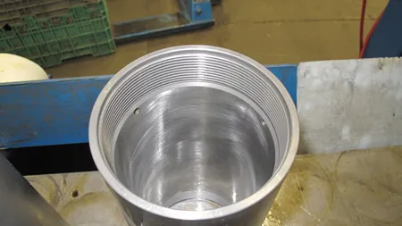 Cylinder honing machine finishing the bore of a steel tube